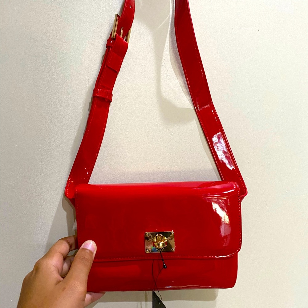 Red purse/belt bag with gold accents